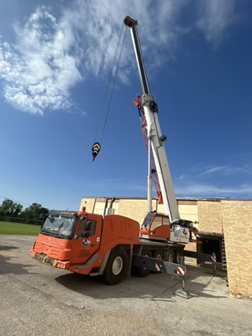 Mobile crane on site at a building project