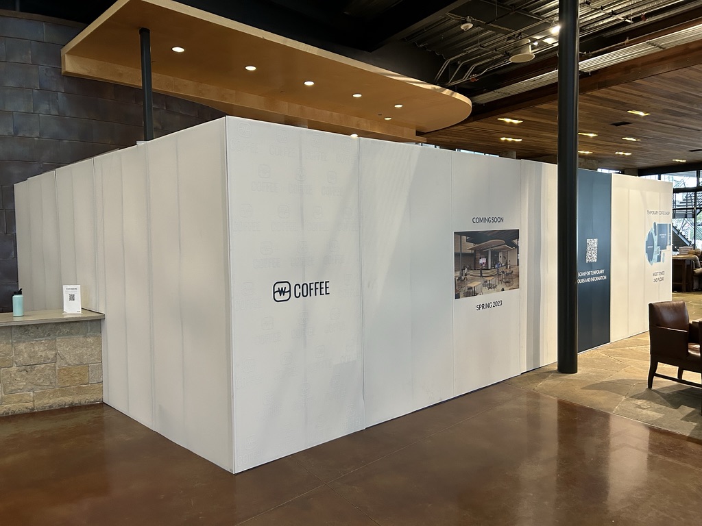 Temporary barrier and signage keep the lobby open and the public informed