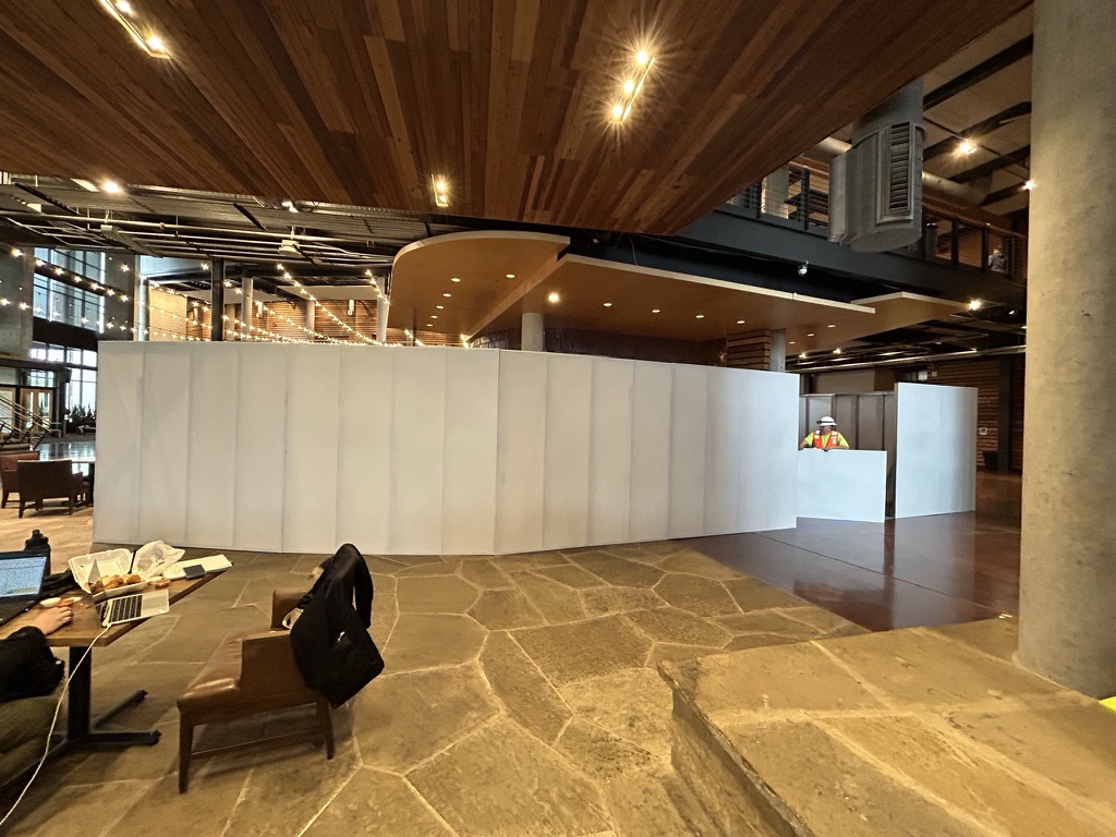 Barrier wall built around the work zone in an active lobby